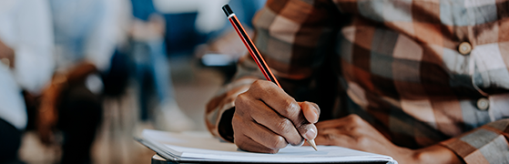Image of an assessment with a person answering a test.